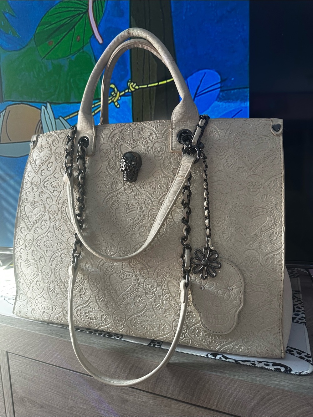 Juicy Couture Cream Embossed Skull Tote with Gunmetal Chain Accents